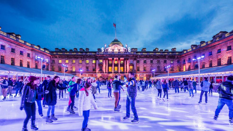 People skating on Somerset House festive winter ice rink